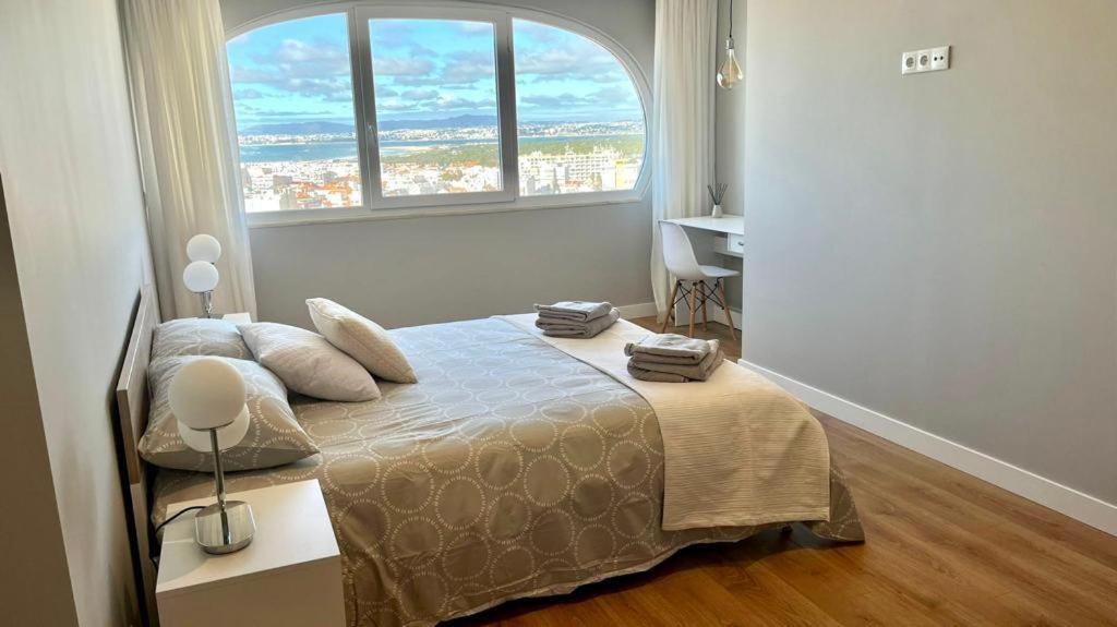T2 Com Uma Vista Deslumbrante Sobre O Atlantico! Apartment Costa da Caparica Bagian luar foto